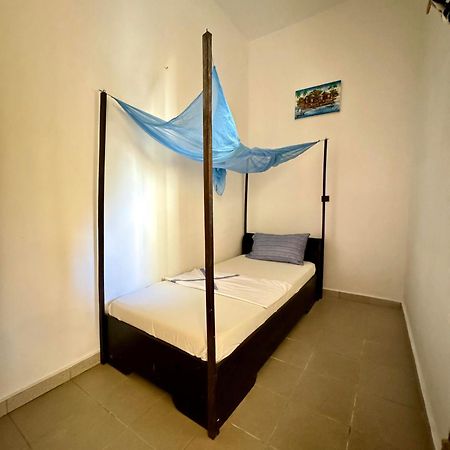Guesthouse Cocotiers 科托努 外观 照片