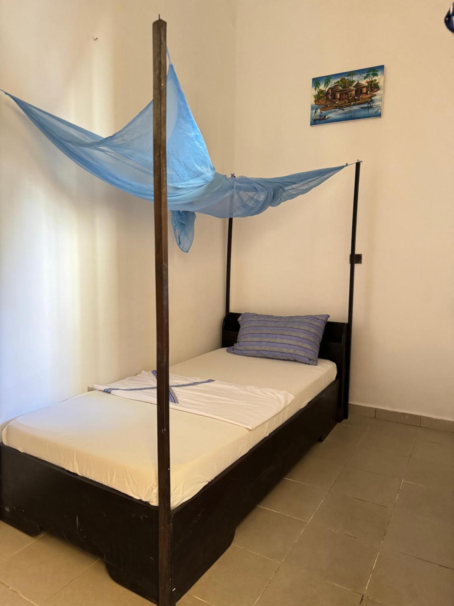 Guesthouse Cocotiers 科托努 外观 照片