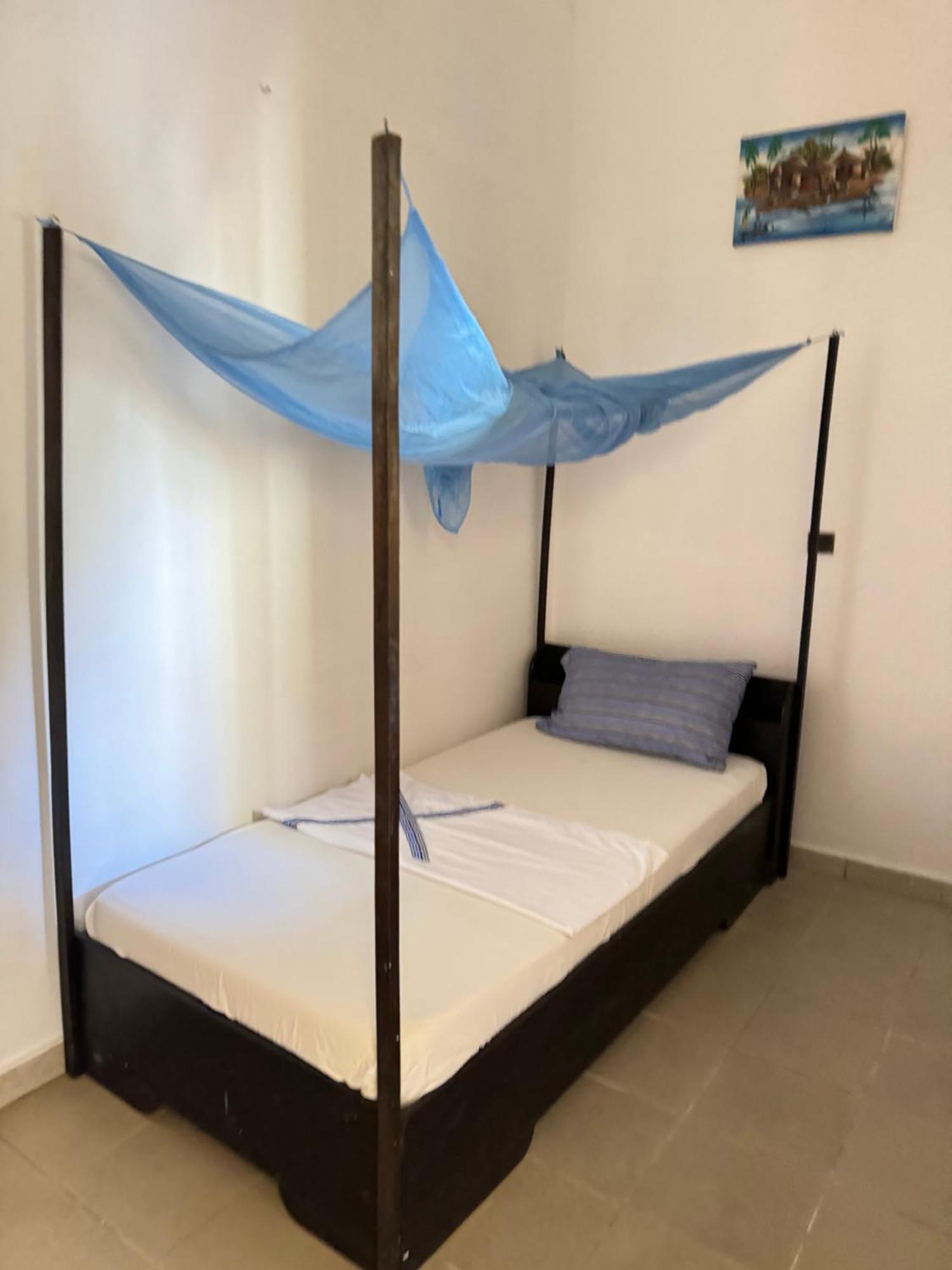Guesthouse Cocotiers 科托努 外观 照片