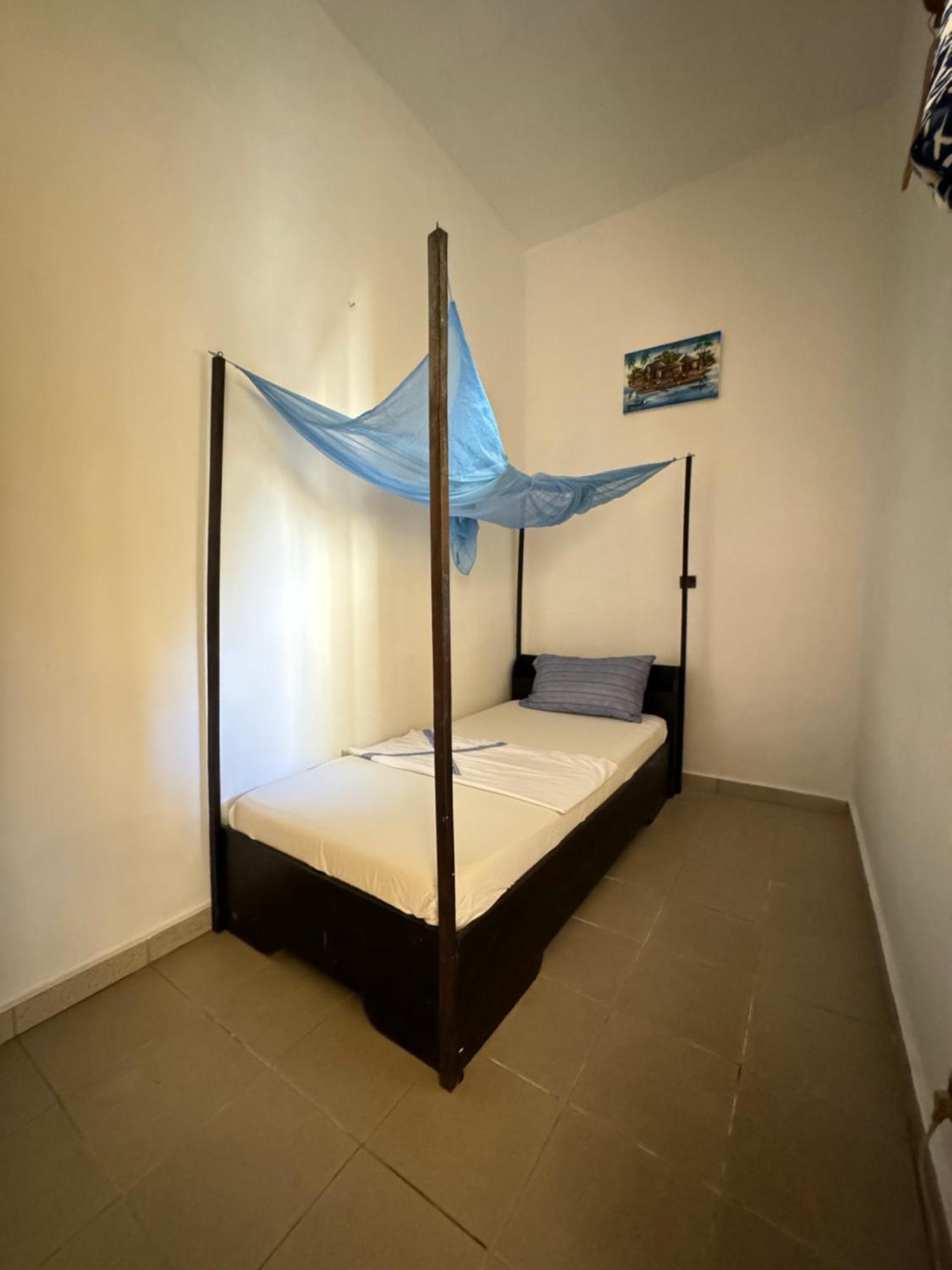 Guesthouse Cocotiers 科托努 外观 照片