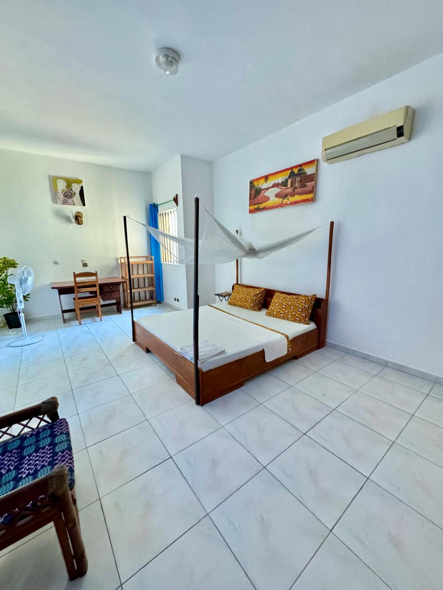 Guesthouse Cocotiers 科托努 外观 照片