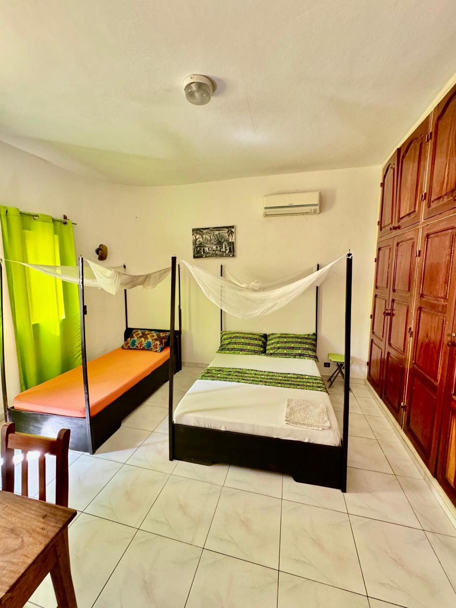 Guesthouse Cocotiers 科托努 外观 照片