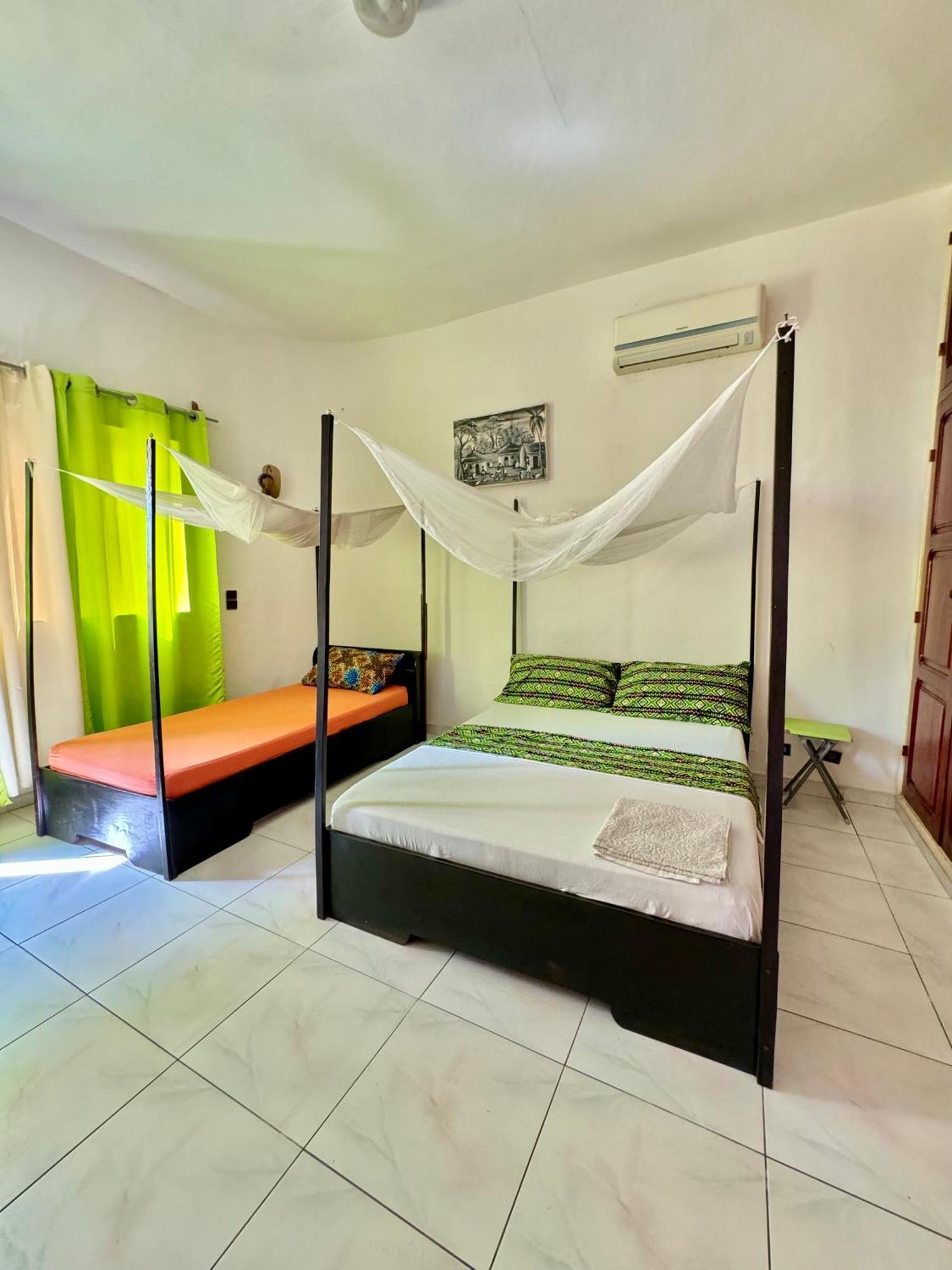 Guesthouse Cocotiers 科托努 外观 照片