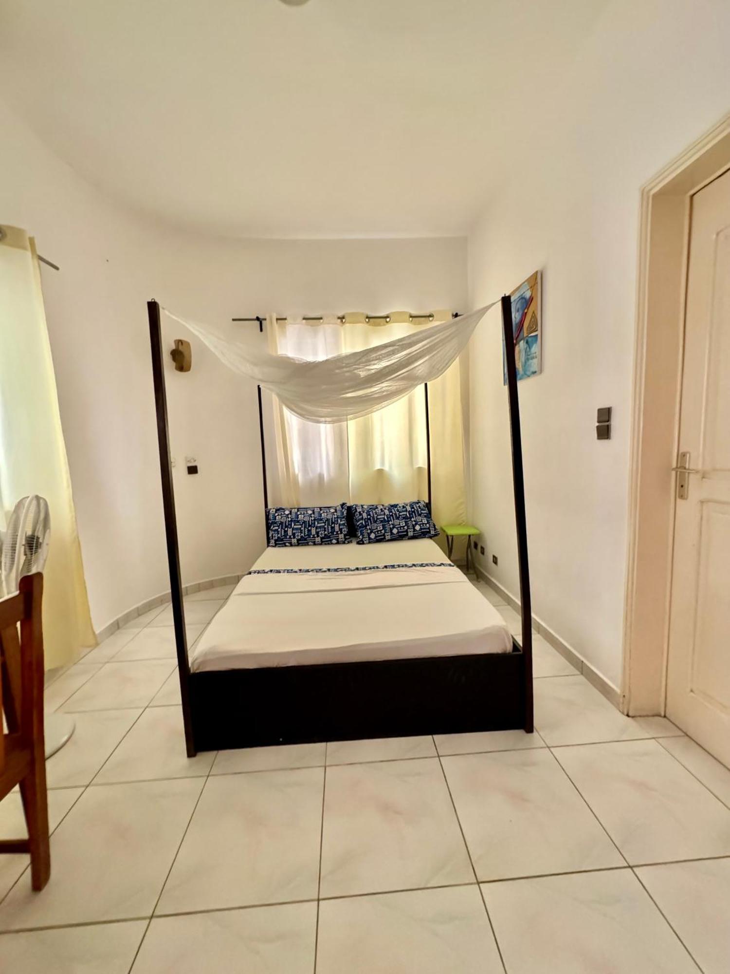 Guesthouse Cocotiers 科托努 外观 照片