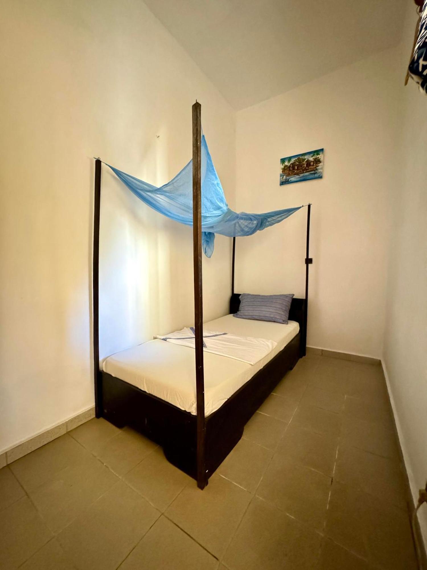 Guesthouse Cocotiers 科托努 外观 照片